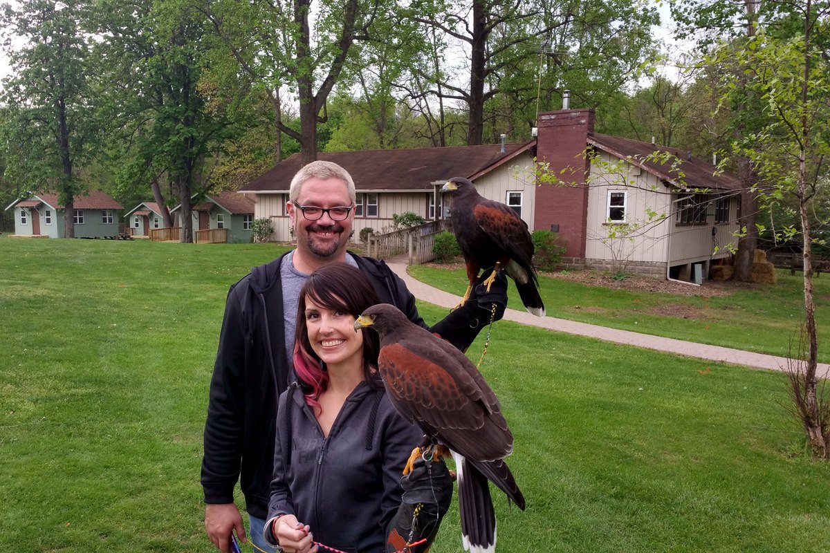Private milestone guests with ambassador hawks at a program location